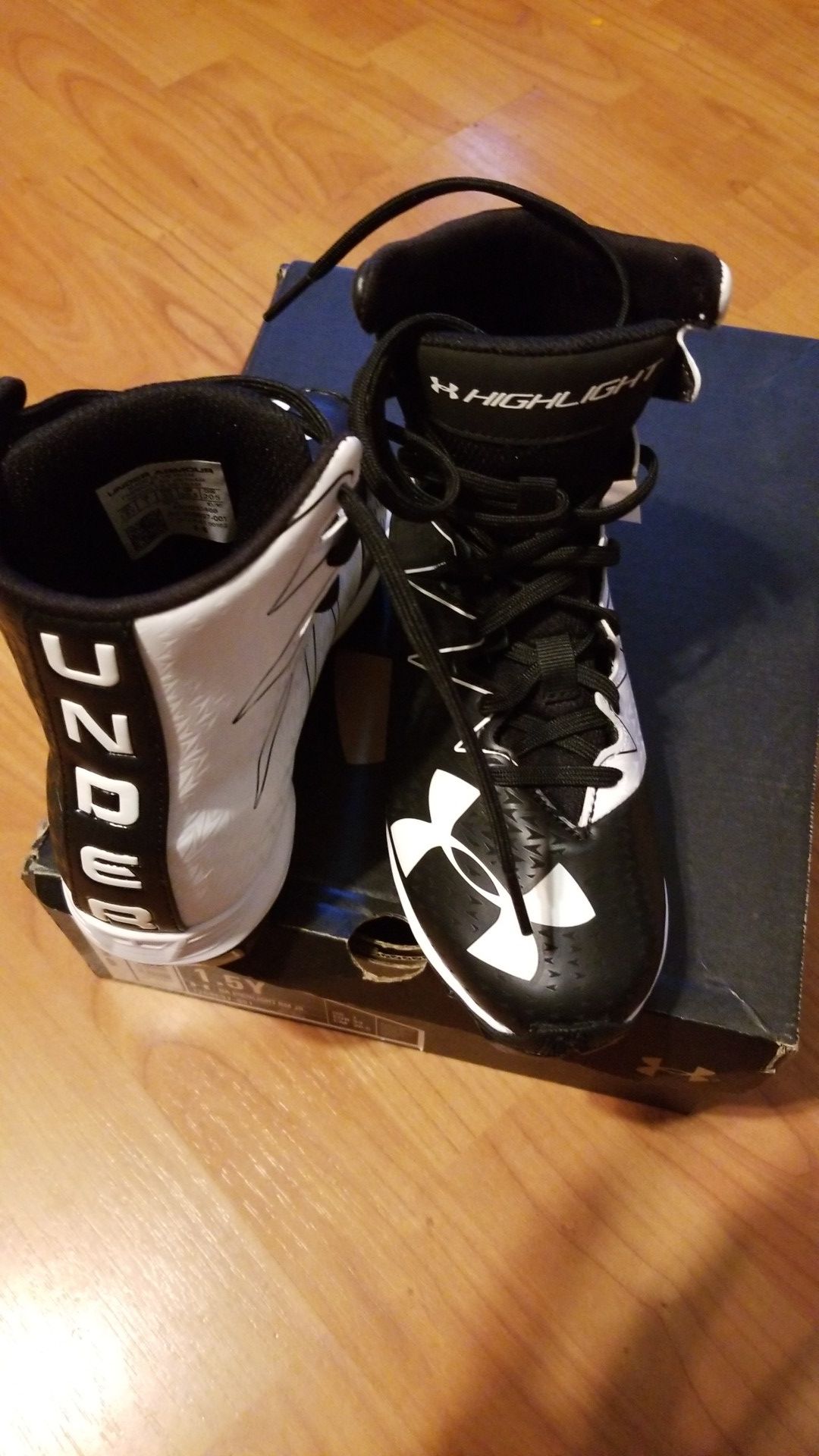 Brand new kids under armour football cleats