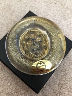 Glass lion head paper weight