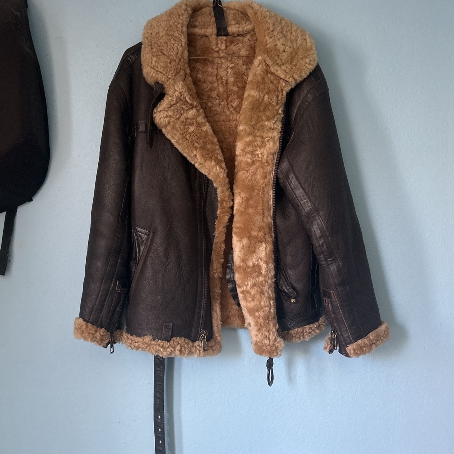 Really warm jacket, alpha industry, Inc. Size is small.