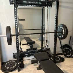 Squat Rack With Weights, Bench, And Curling Bar