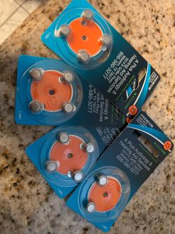 a packet of Size 13 mercury-free zinc-air hearing aid batteries.