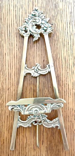 Vintage, brass ornate tabletop display stand.
