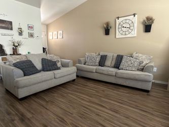 Ashley Furniture Beige Sofa & Loveseat Set
