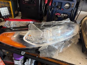 2015 Ford fusion headlight $50