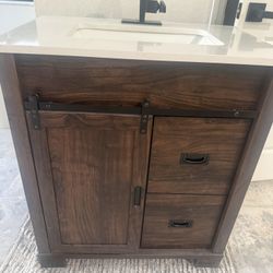 Vanity with sink.  Faucet not included 
