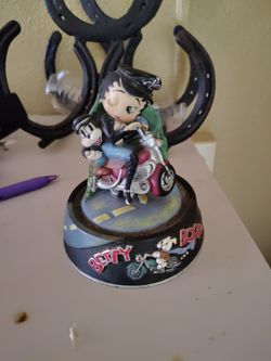 This is the Westland Giftware Betty Boop & Pudgy Motorcycle Biker Musical Figurine