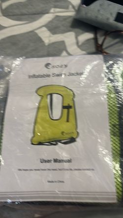 Inflatable, swim jacket