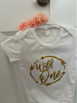 Wild one first birthday outfit onesie with tutu skirt and headband, size 12 months. I’m available in Oswego and Joliet areas