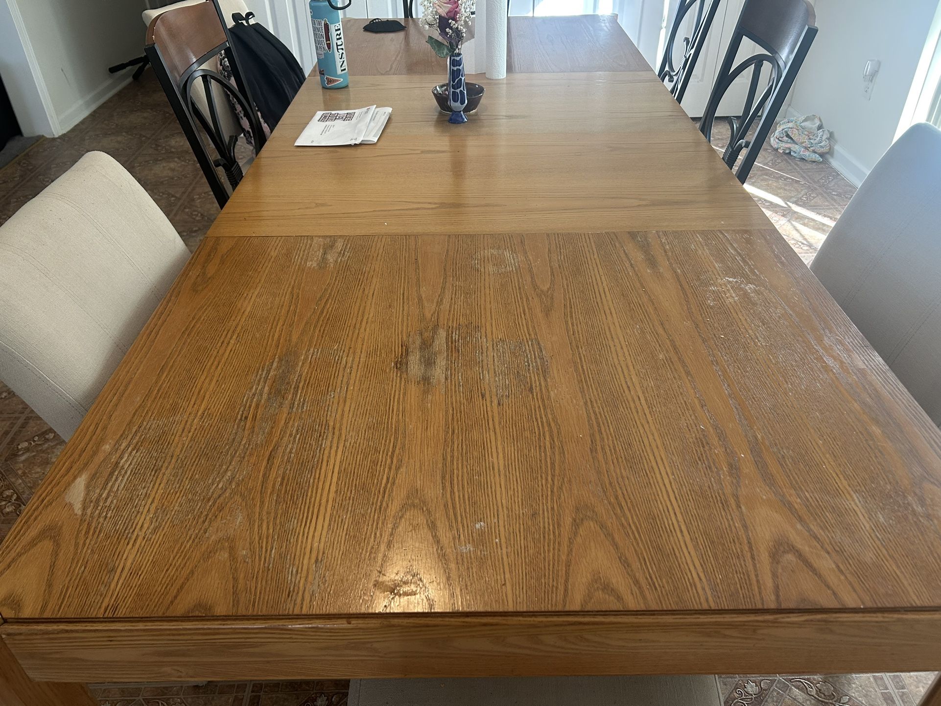 Long Dining Room table with 4 fabric chairs