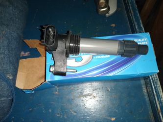 GM Coil & 2 Spark plugs- NEW