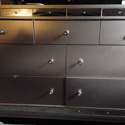 Dresser And Nightstand And A Mirror