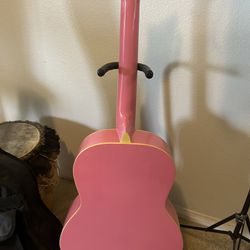 Debutante Junior Miss Acoustic guitar, case and stand included.