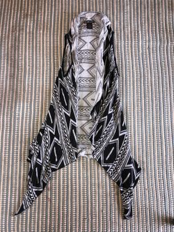 Women’s black and white vest sweater- long, size small/medium (could fit up to a large)