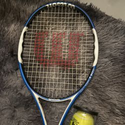 tennis racket with balls 