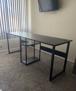 2 person black desk with shelves