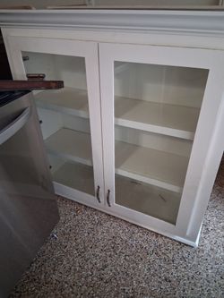 White Wood Cabinet with Glass Doors