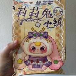 Damaged box Baby Three Lily Rabbit Town V4 Plush blind box. Please view all photos for actual condition.