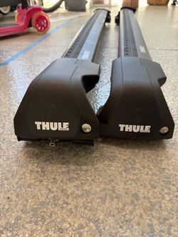 Thule flush roof rail rack with crossbar