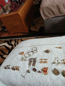This was my friend's who passed away. It is just jewelry  cuff links and rings size 10 I think.