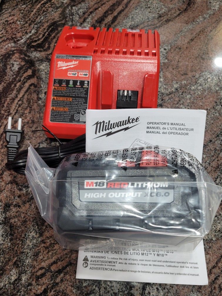 NEW MILWAUKEE M18 HIGH OUTPUT 6.0 BATTERY AND CHARGER.