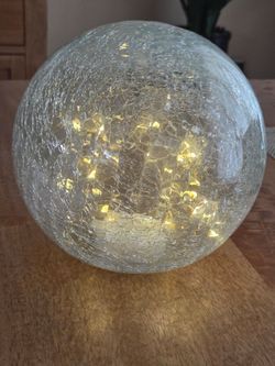 Sphere lights up with light string