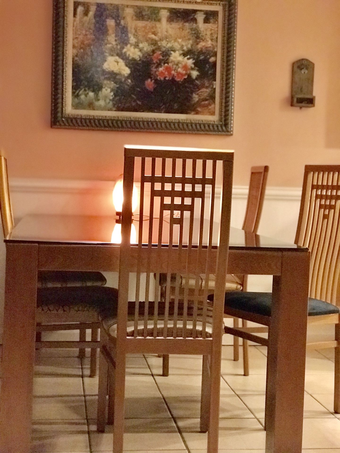 Dining room with six chairs and temper black glass