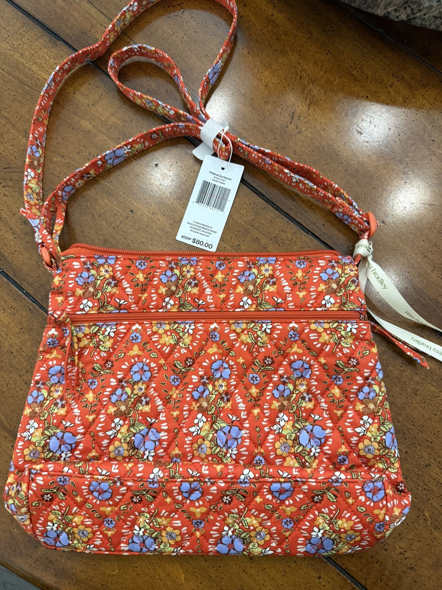 Brand new Vera Bradley hipster and cosmetic case. In garden paisley. Comes from a smoke free home. 