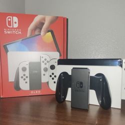 Nintendo Switch OLED 64GB With Games Mariokart8 Deluxe and Marvel Superheroes 2