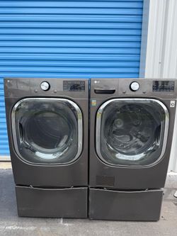 LG Smart Ultra Capacity Washer and Dryer Set with Stainless Steel Pedestals
