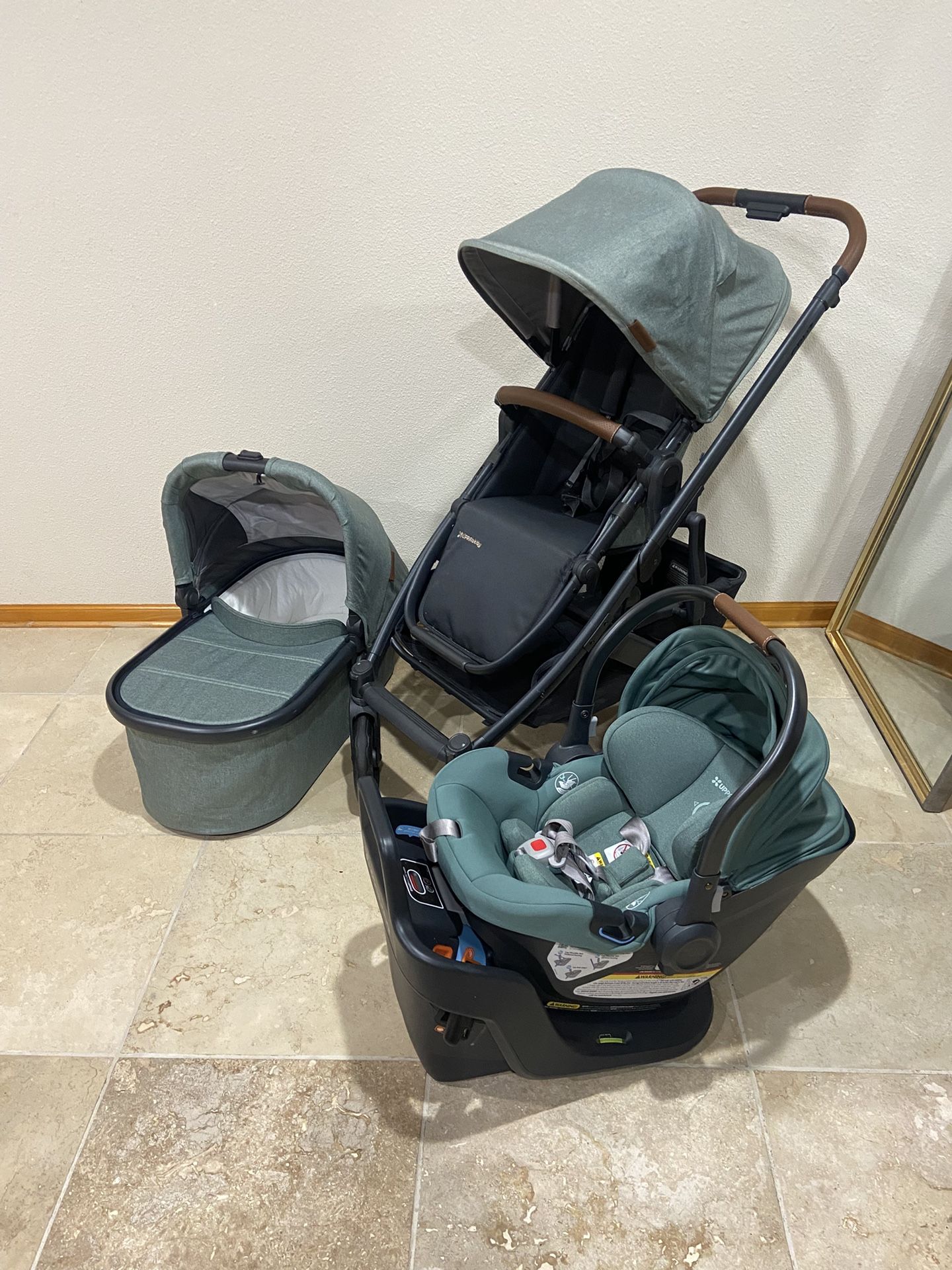 Uppababy Cruz V2 Stroller with bassinet and Aria Car Seat light green exp 2031