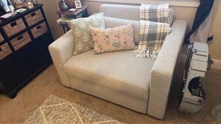 Couch that converts to Twin Bed , Basically Brand New !