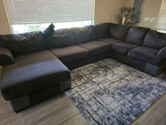 Large Brown Sectional Sofa with Chaise