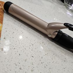enlarged curling iron.