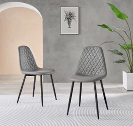 East Urban Home Morral Luxury Diamond Quilt Stitched Faux Leather Upholstered Tapered Metal Leg Dining Chairs (Set of 2)