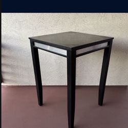 One Black Solid Wood Square Dining Table With Stainless Steel Trim