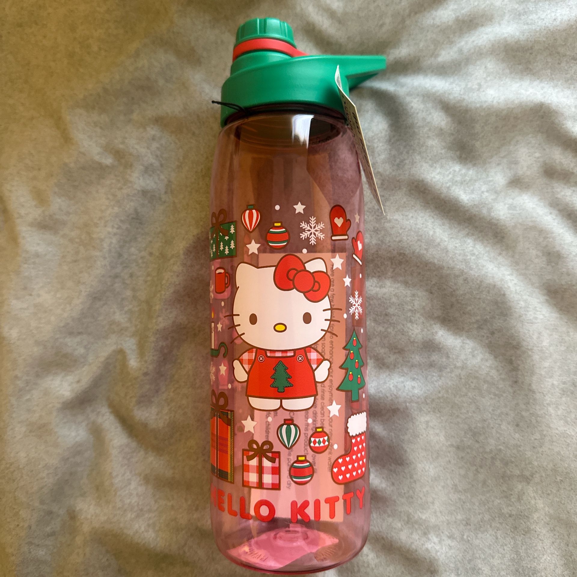 Hello Kitty water bottle with a Christmas-themed design