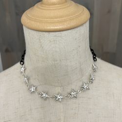 Two tone star necklace