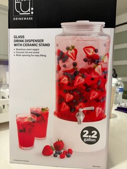 Glass drink  dispenser with ceramic stand
