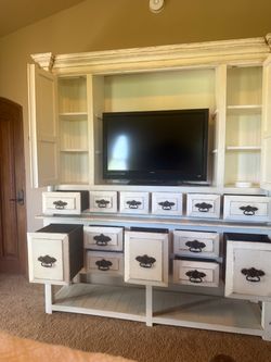 Large cabinet with shelves and drawers