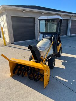 Cub Cadet.  (rider-snowblower)