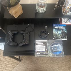PS4 Console,  2 PS4 Controllers, All Wires and Cables Included, Just Cause 4 Game Disc Included, Built-In DVD Blu-Ray Disc Player