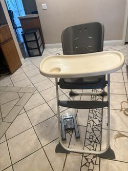 High Chair And Toy Chest.