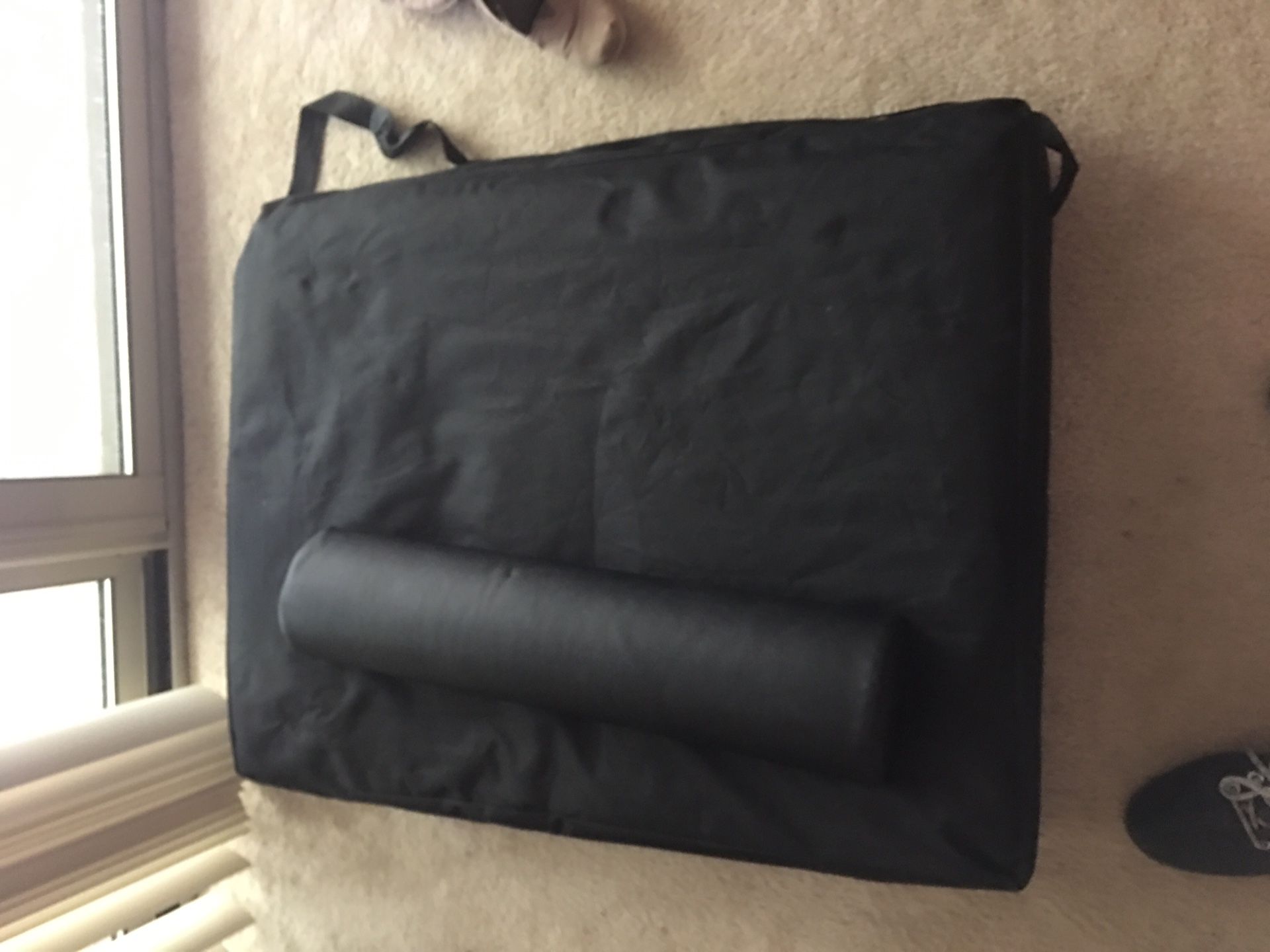 Massage table with bag and extra pads
