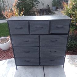 Fabric, wood and metal 9 drawer dresser