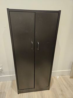 Black cabinet with shelves