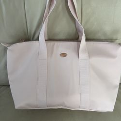 COACH Receive a Free Tote Bag with any large spray purchase from the Coach Women's Fragrance Collection