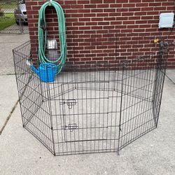 An octagon puppy or small dog pen with door