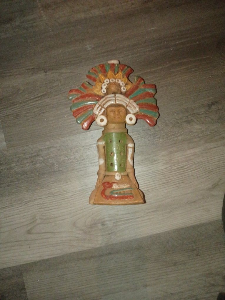 vintage Aztec or Mayan clay flute, also referred to as a whistle or ocarina
