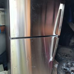 Brand New G.E. Stainless Steel Refrigerator 