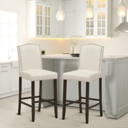 Nailhead-trimmed barstools
